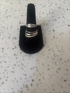 Bundle of sterling silver rings. Approximate sizes 4, 6, 7